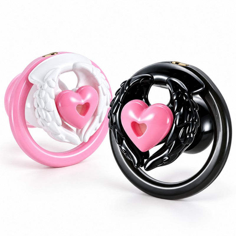 Angel wing inverted chastity cages in white wings with pink heart and black wings with pink heart color combinations.