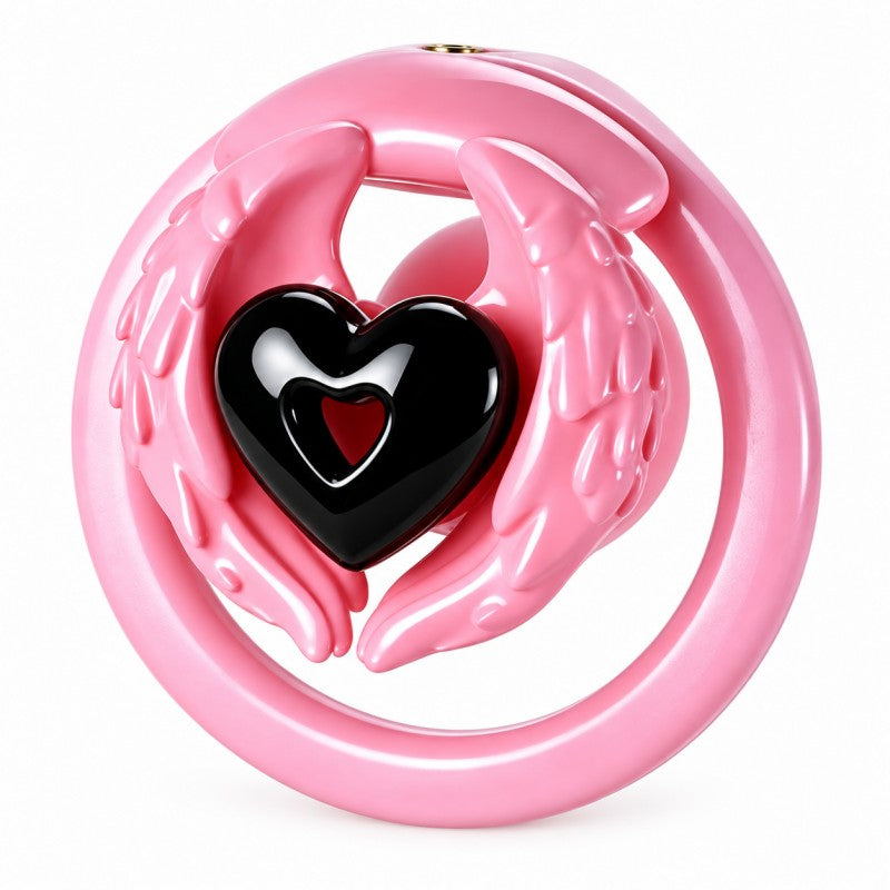 Angel wing inverted chastity cage with pink feathered wings, a black heart centerpiece and a pink base ring.