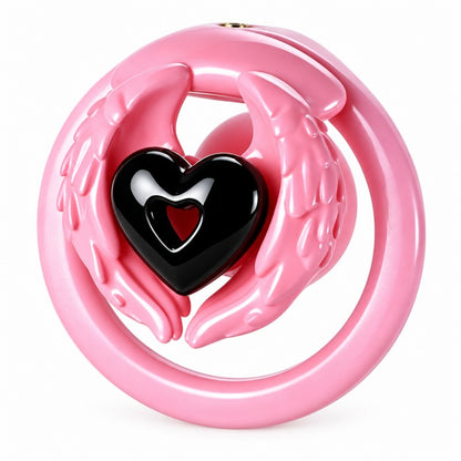 Angel wing inverted chastity cage with pink feathered wings, a black heart centerpiece and a pink base ring.