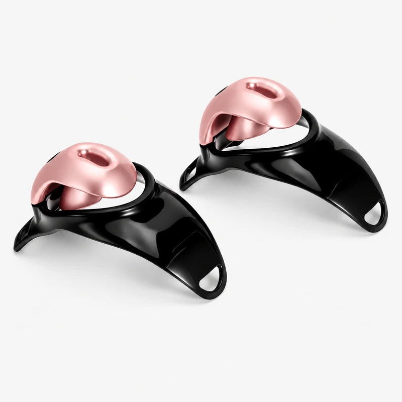 Two low-angle views of the rose gold resin chastity cage with black bases.